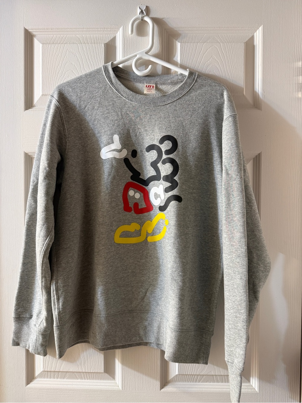 Uniqlo Grey Crewneck Sweatshirt with Red, Yellow, Black and White Graphic